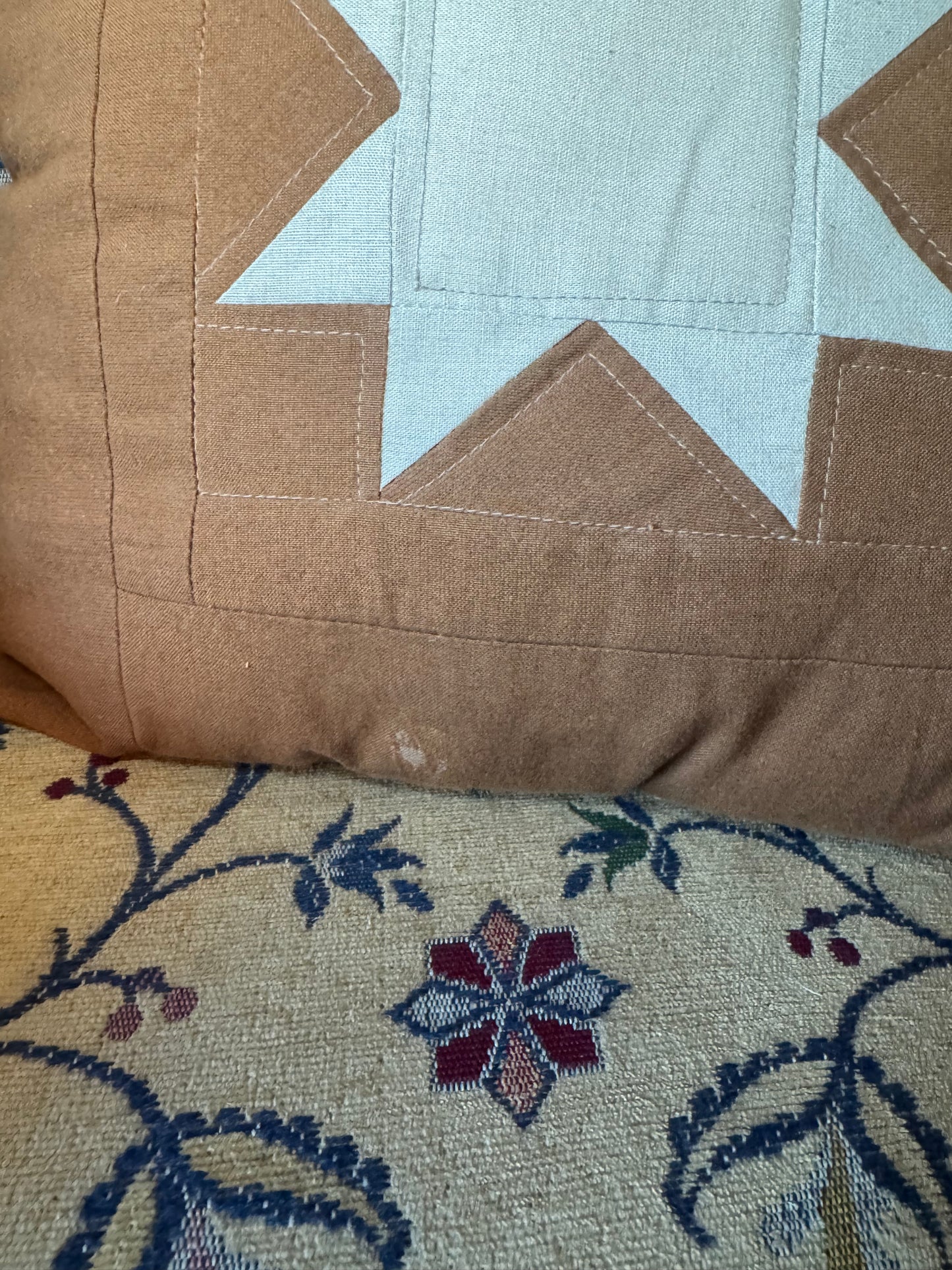 Brown and White Quilted Star Pillow