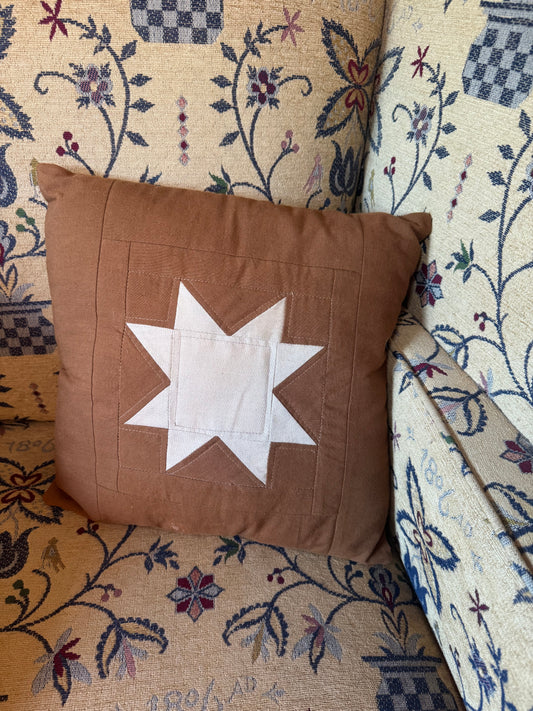 Brown and White Quilted Star Pillow
