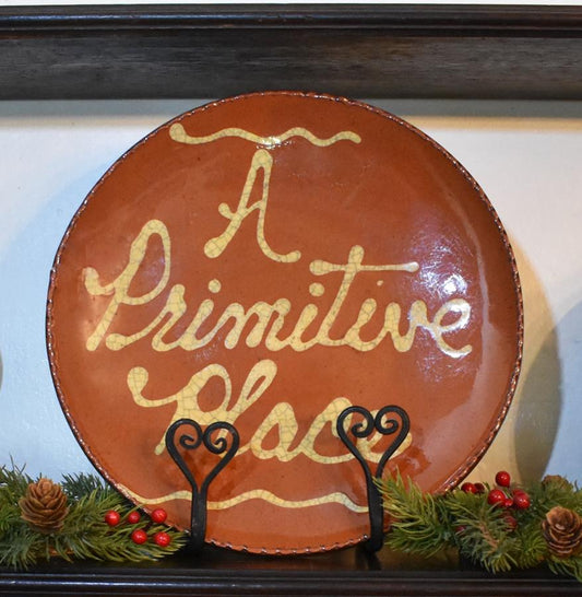A Primitive Place Redware Plate