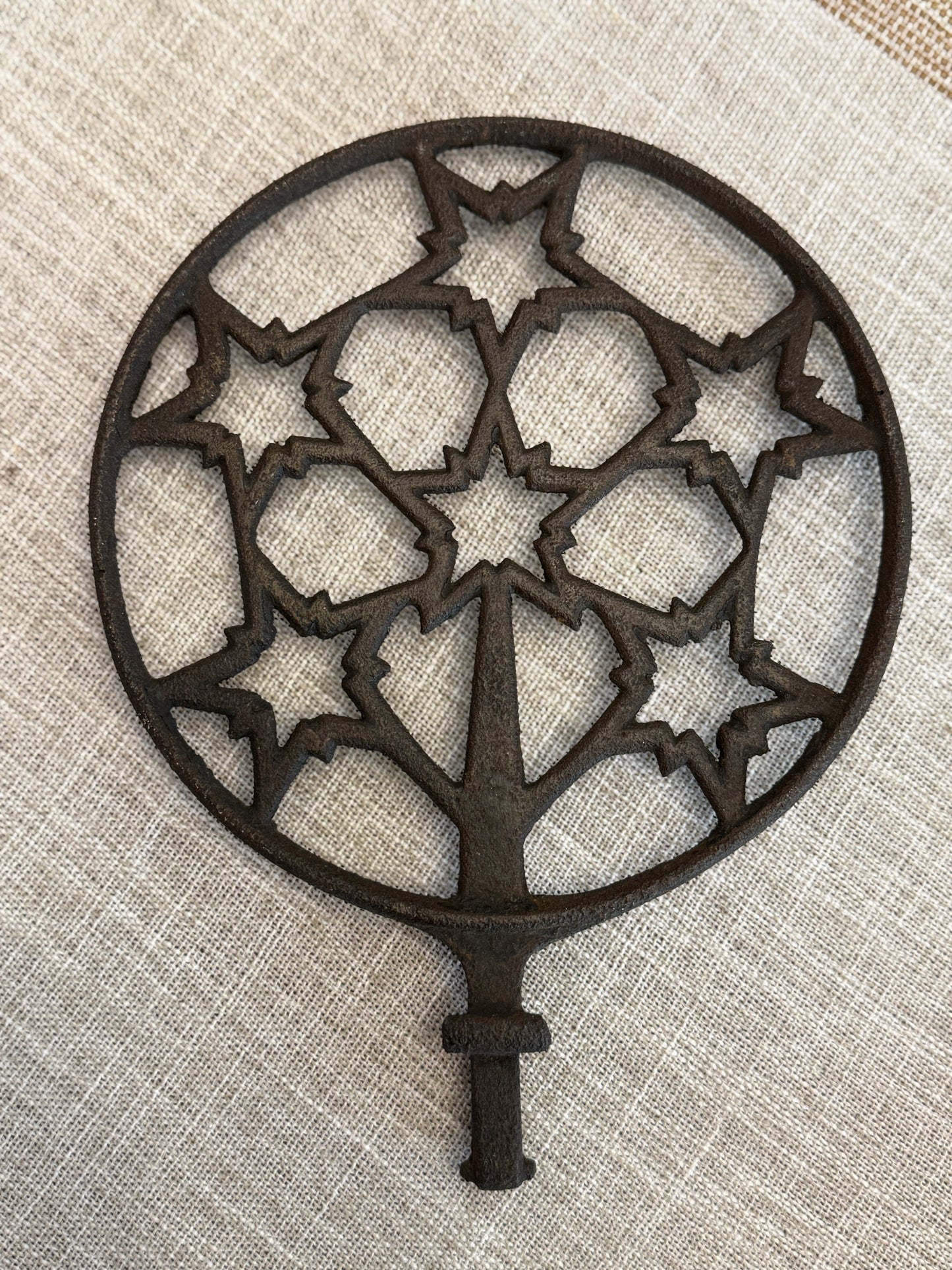 Antique Cast-Iron Trivet (Starburst / snowflake folky pattern)