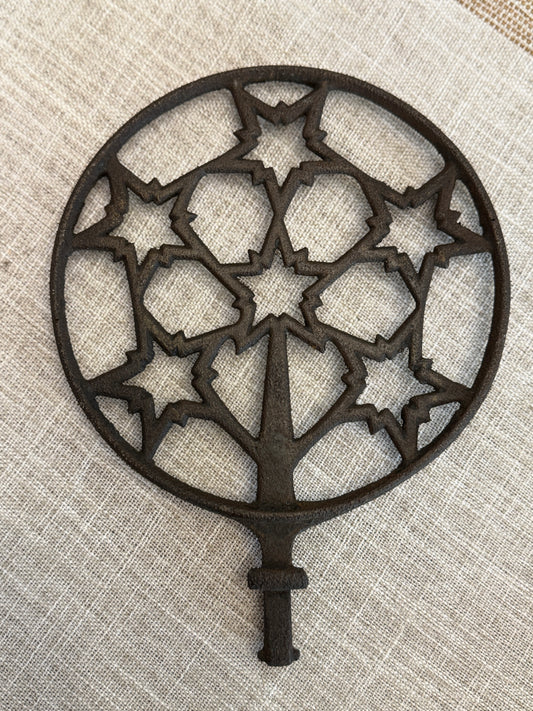 Antique Cast-Iron Trivet (Starburst / snowflake folky pattern)